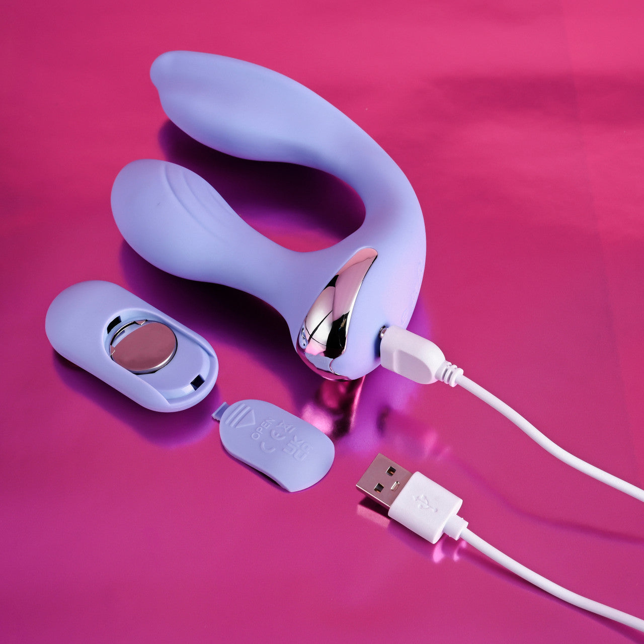 Evolved Every Way Play Evolved Novelties vibrator with remote control open to show battery compartment and included battery