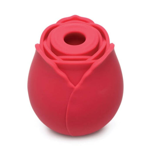 Red silicone rose-shaped vibrator by Bloomgasm on a white background