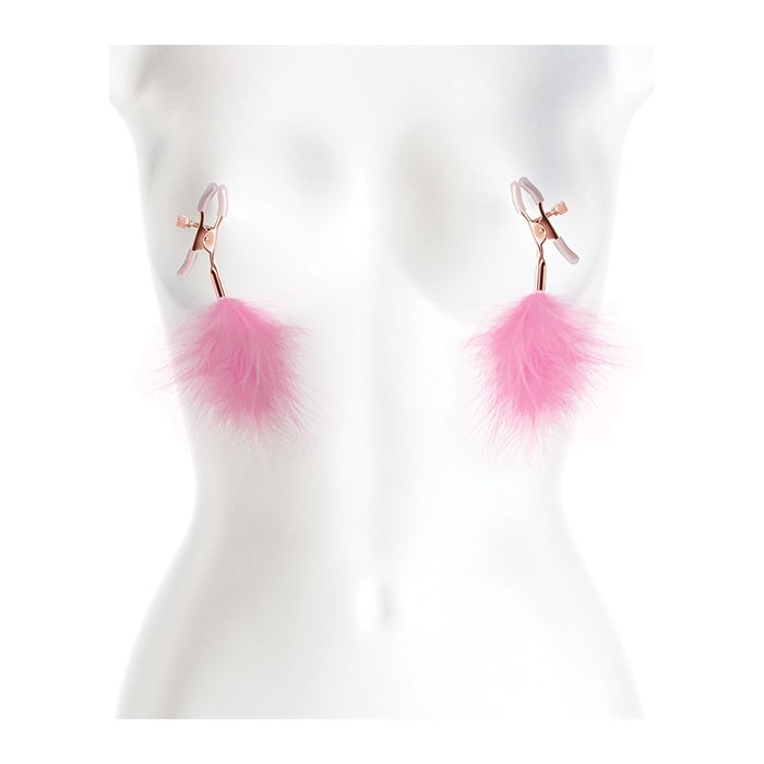 Bound F1 adjustable nipple clamps with pink feathers worn on woman’s chest showing placement
