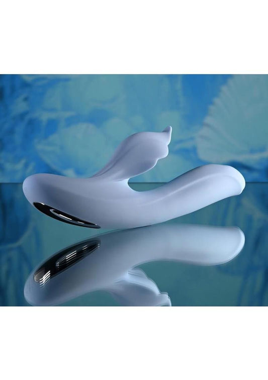 Lifestyle shot of Blue butterfly-shaped Evolved Playboy In Bloom Rabbit Vibrator on a blue background
