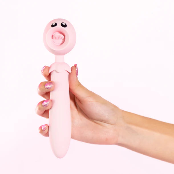 Natalies Toy Box Lick n' Stick Dual Ended Flicker & G-Spot Vibrator in a woman's hand