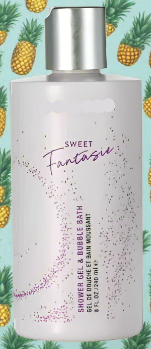 Bottle of Pure Romance 'Sweet Fantasie' shower gel with pineapple pattern in the background