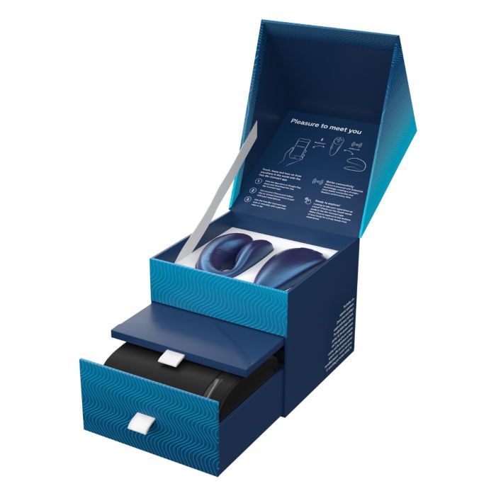 We-Vibe chorus fold-out box display with compartments for toy, remote and charger.