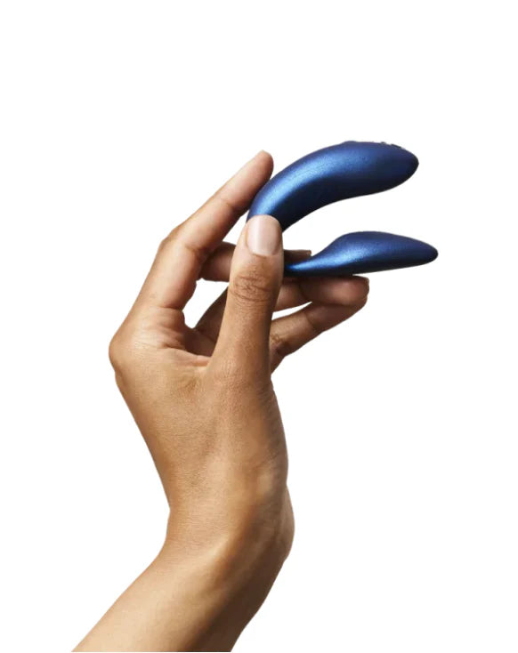 We-vibe chorus n a woman's hand to show size reference.