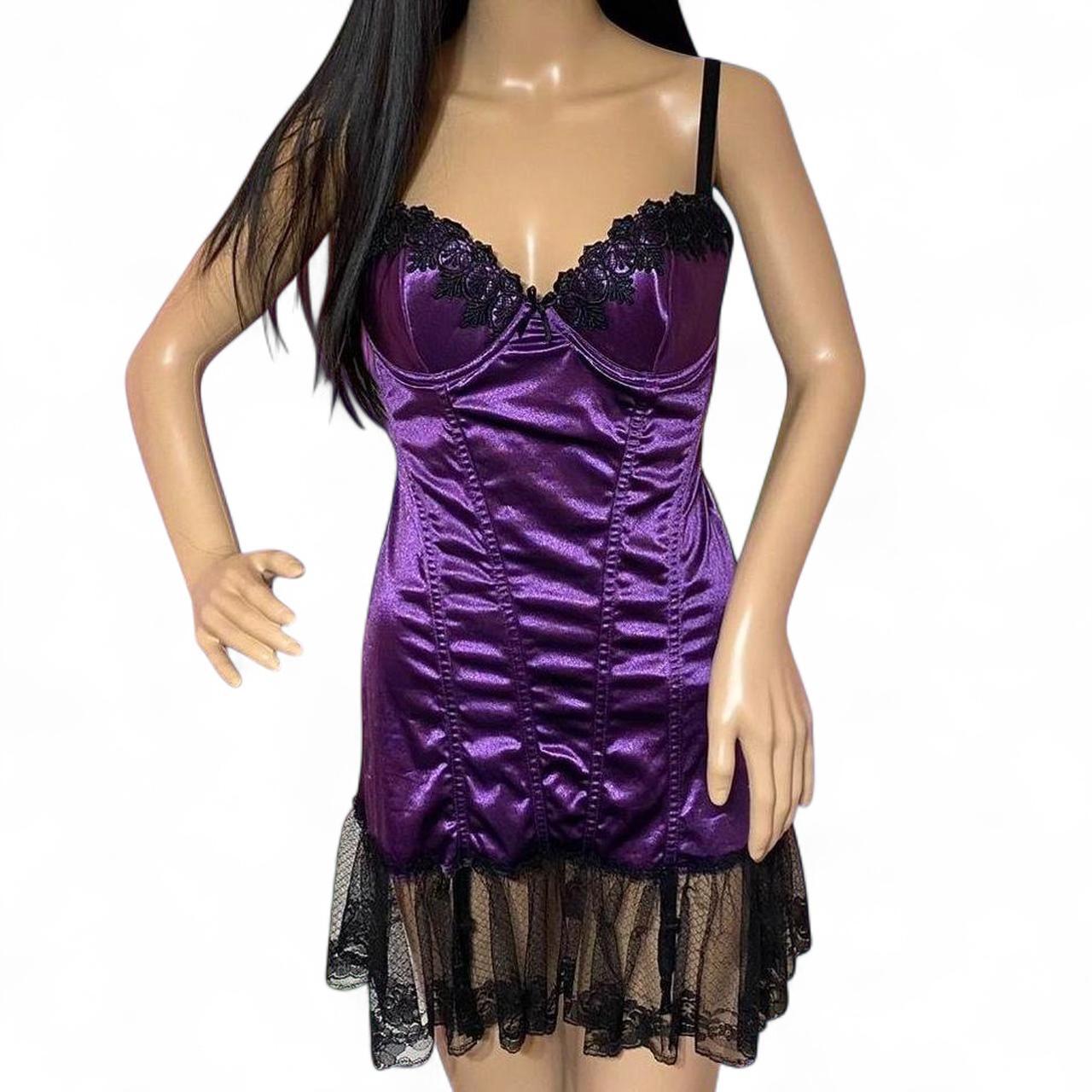 Escante luxury purple babydoll dress with ruched slinky front, black long lace ruffles at hem, and delicate lace accents — front view