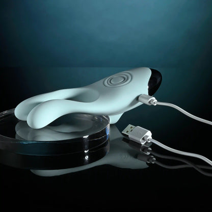 White USB cable for Couples Therapy toy by Evolved Novelties on dark background.