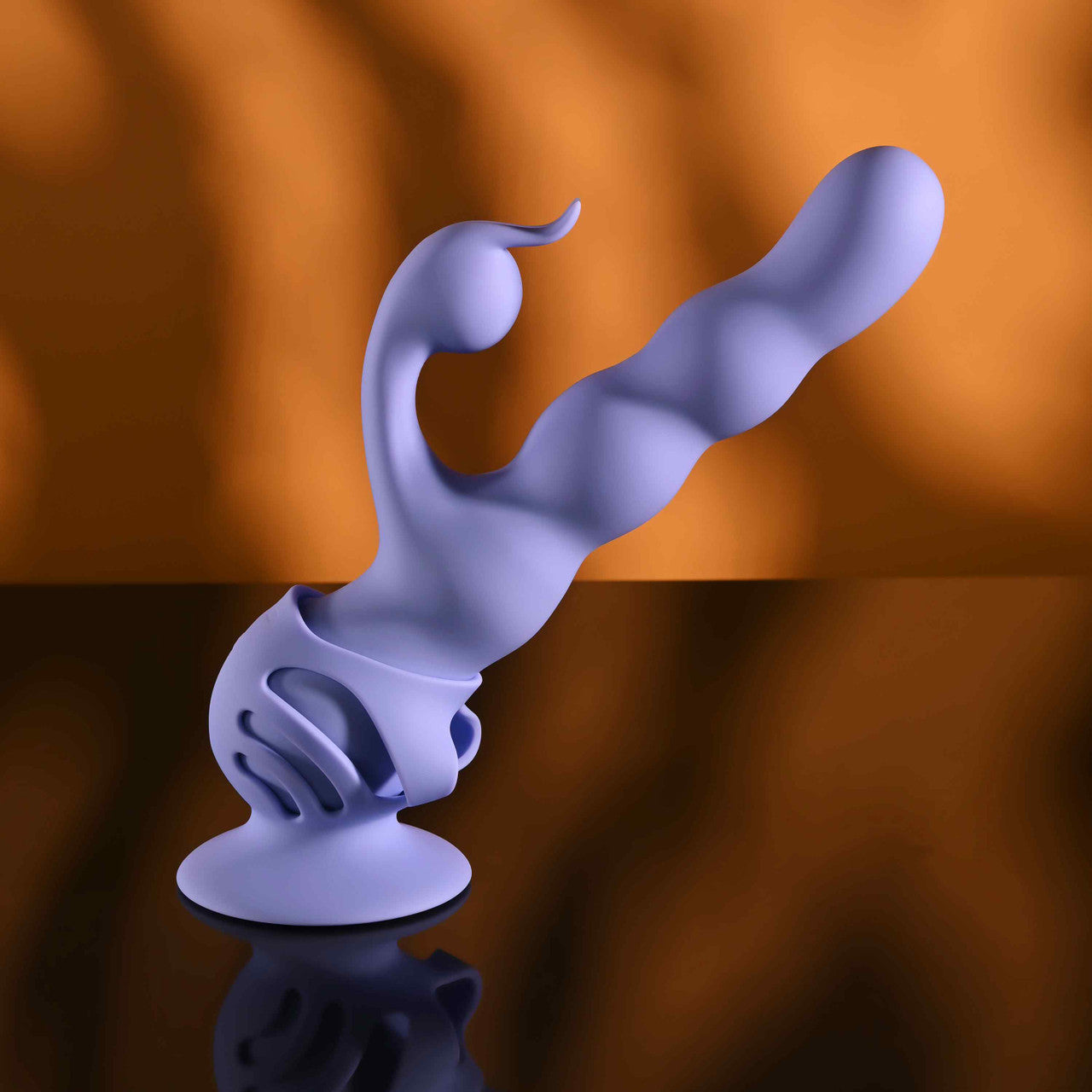 Purple Evolved Wiggly Bunny Vibrator with Suction cup attachment on a white backgrounddecorative design on a reflective surface