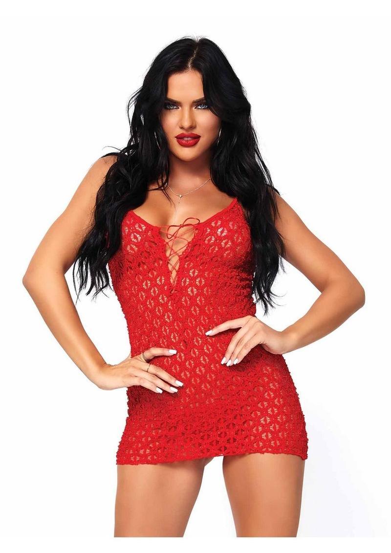 Woman wearing a Leg Avenue Mini Dress with Lace Up Front & G-String lace dress on a white background 