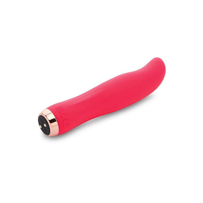 Nu Sensuelle Bella Velvet Touch Vibe Pink on it's side showing rechargeable feature on a white background
