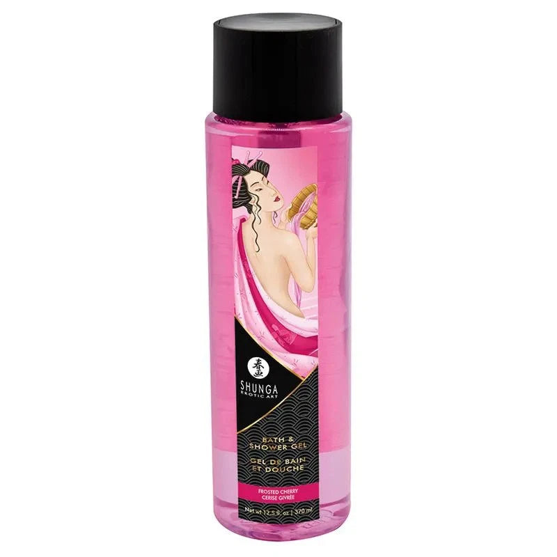 A bottle of Shunga Bath & Body Gel de Bain in Frosted Cherry featuring a translucent pink bottle with a black cap and a vintage-style label illustration on a white background.