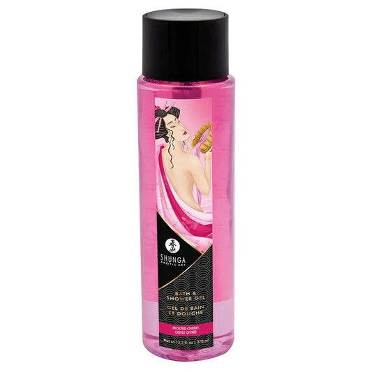 A bottle of Shunga Bath & Body Gel de Bain in Frosted Cherry featuring a translucent pink bottle with a black cap and a vintage-style label illustration on a white background.