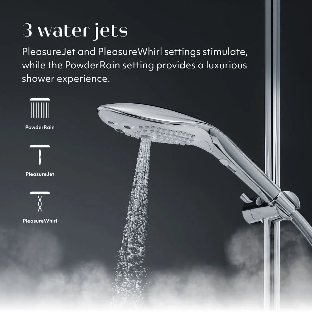 Womanizer WAve Shower head with water jets labeled PowderRain, PleasureJet, and PleasureWhirl on a dark background.