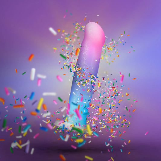 Colorful confetti exploding from Blush Avant D17 Lucky multi-color silicone dildo.