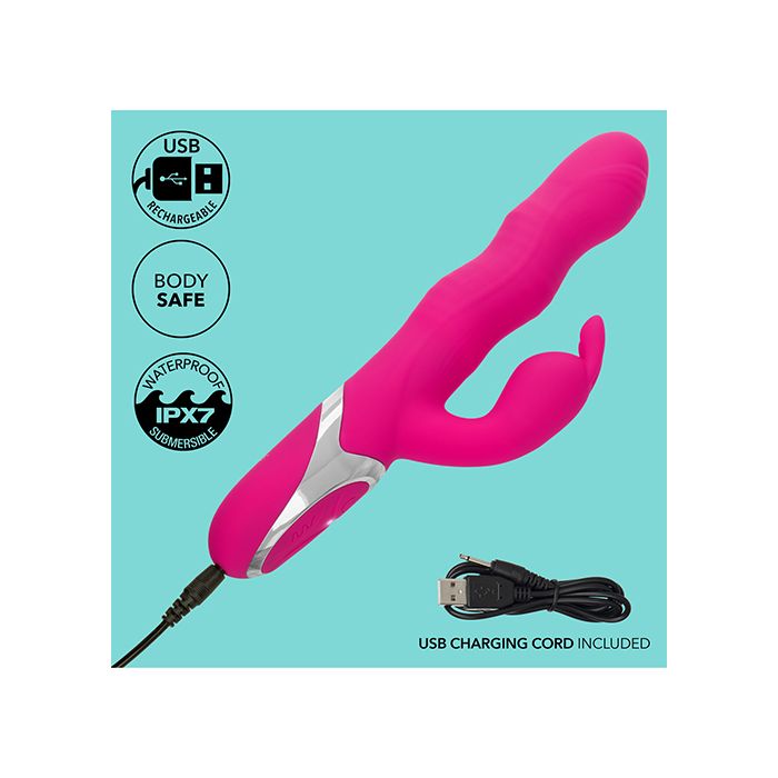 Pink USB rechargeable Calexotics Enchanted Wave Action Bunny Vibrator with charging cord on a blue background