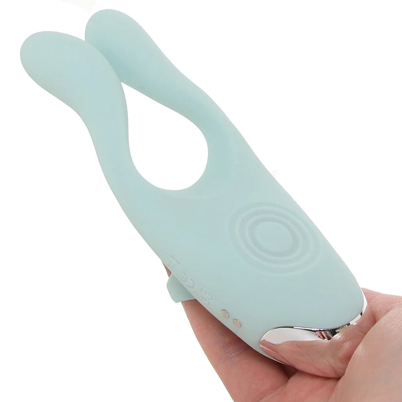 Couples Therapy by Evolved Novelties Light blue silicone toy held in a hand against a white background