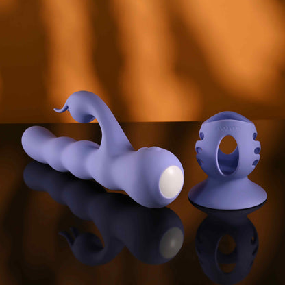 Purple Evolved Wiggly Bunny Vibrator with Suction cup attachment on its side on a reflective background