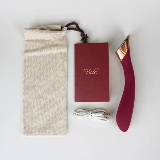 Manto Touch Panel G-Spot Vibrator Wine Red with storage bag, instruction manual and charge cord on a white background.