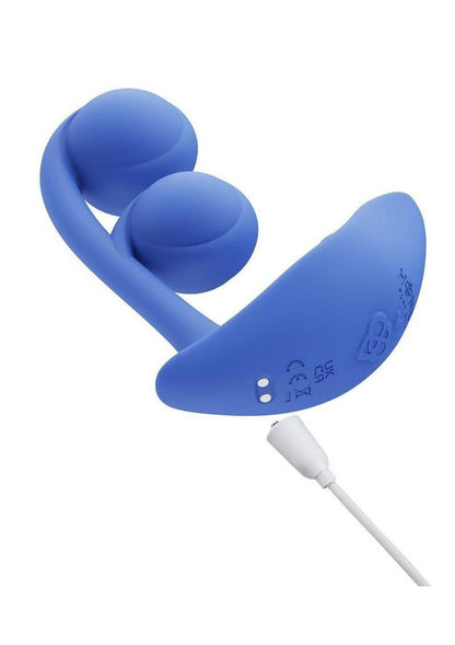 Honey Play Box Meloday Dual Orb App Controlled wearable vibrator showing usb cord rechargeable ability on a white background