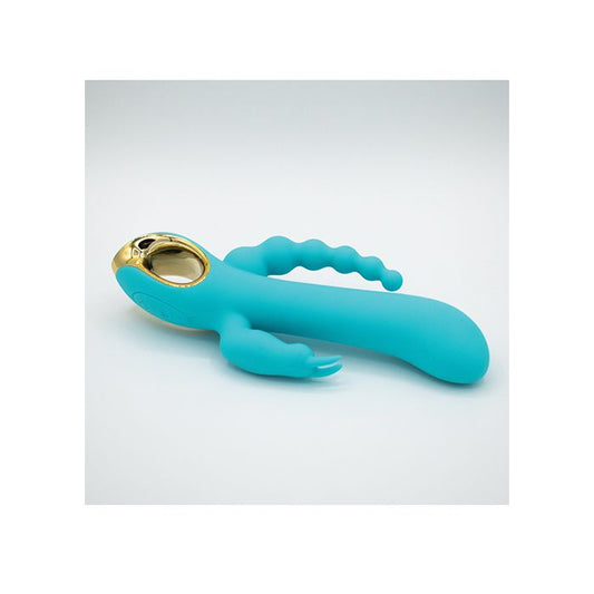 Turquoise and gold toy on a light gray background, Like A Kitten Mighty Magic