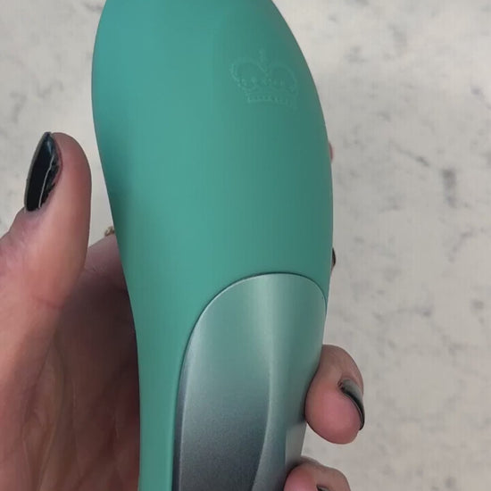 Hot Octopuss Pulse Queen Oscillating Wand How To Use Instructions with a woman speaking and holding item against a granite background