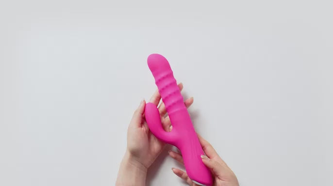 Woman's hands holding Lovense Velvo Rabbit Vibrator, providing Instructions on how to use the item.