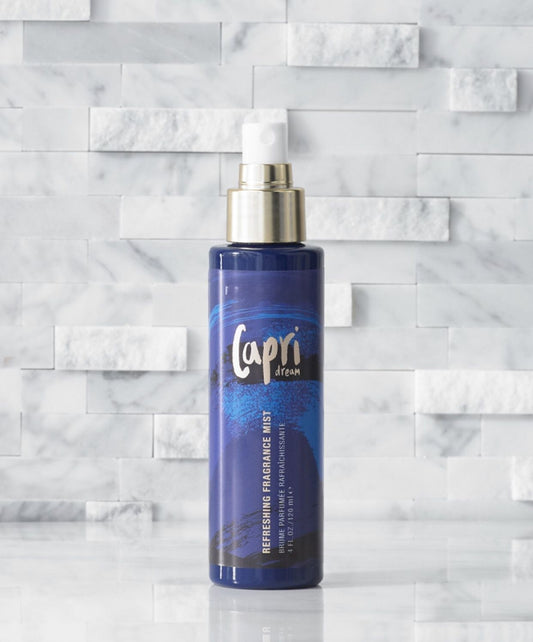 Capri Dream Fragrance Mist bottle with ocean wave label, scented with jasmine, dragon fruit, and agave nectar