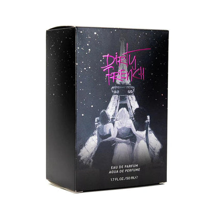 Perfume box with 'Dirty French' branding and an image of three women sitting under the Eiffel Tower.