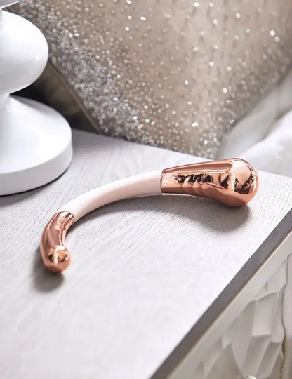 Luxury manual G-spot wand made from rose gold plated surgical stainless steel by Pure Romance