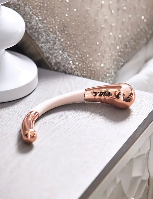 Luxury manual G-spot wand made from rose gold plated surgical stainless steel by Pure Romance