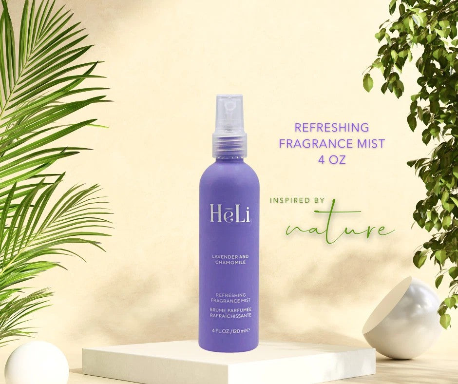 Purple bottle of HelI refreshing lavender and chamomile refreshing fragrance mist with green plants in the background