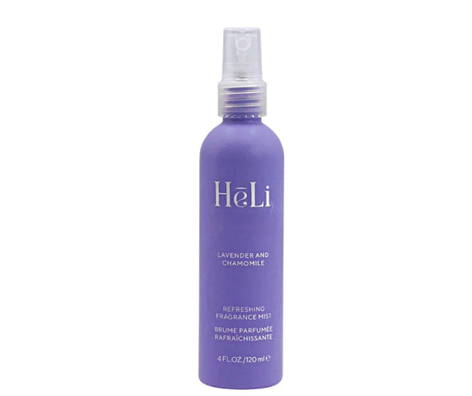 Purple bottle of Pure Romance Heli Lavender and Chamomile refreshing fragrance mist on a white background