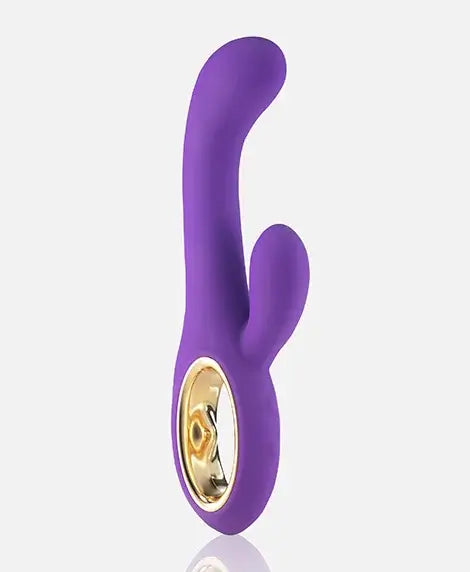 Pure Romance Standing Ovation dual action rabbit vibrator on a white background.