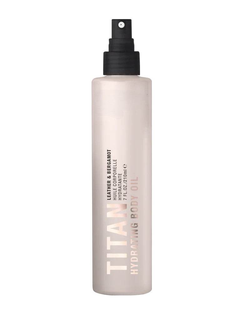 Titan hydrating leather bergamot body oil bottle on a white background by Pure Romance