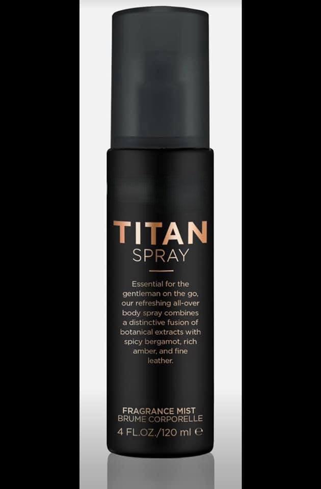 Black Pure Romance Titan Spray bottle on a gray background