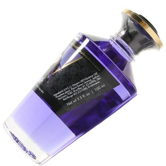 Shunga warming oil Exotic Fruits packaging with ingredients listed and 3.5 fl oz and 100 ml on a white background