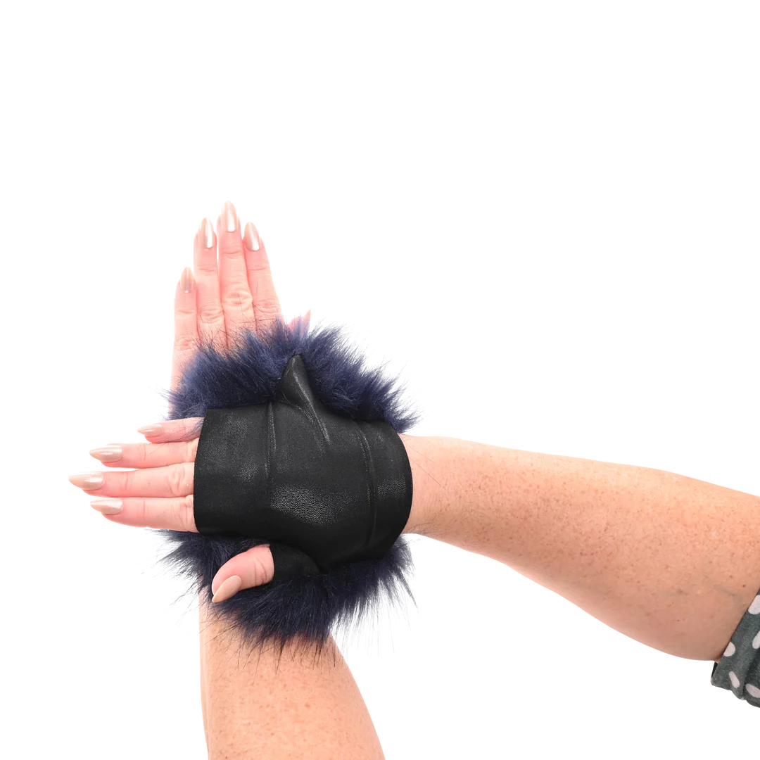 Black Sportsheets Cougar Spiked Sensory Glove held by a hand on a white background to show how to use item.