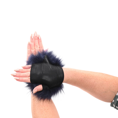Black Sportsheets Cougar Spiked Sensory Glove held by a hand on a white background to show how to use item.